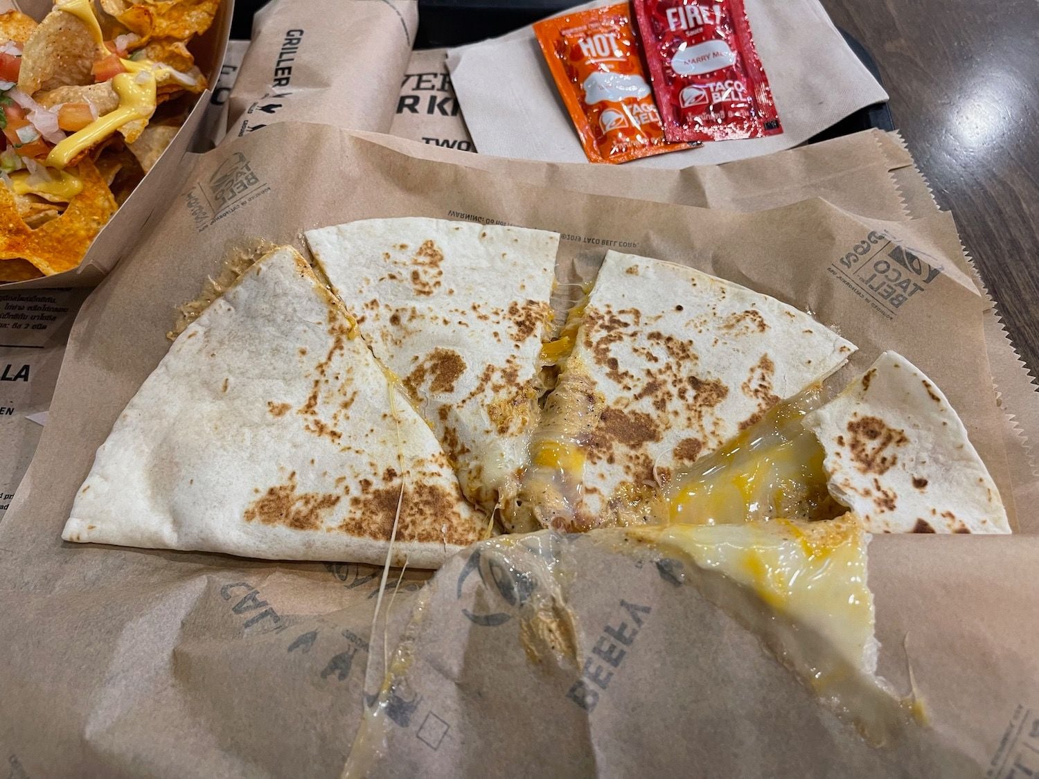 Taco Bell's Fresh Menu Addition: A Rolled Quesadilla Boasting Poblano & Steak Flavor